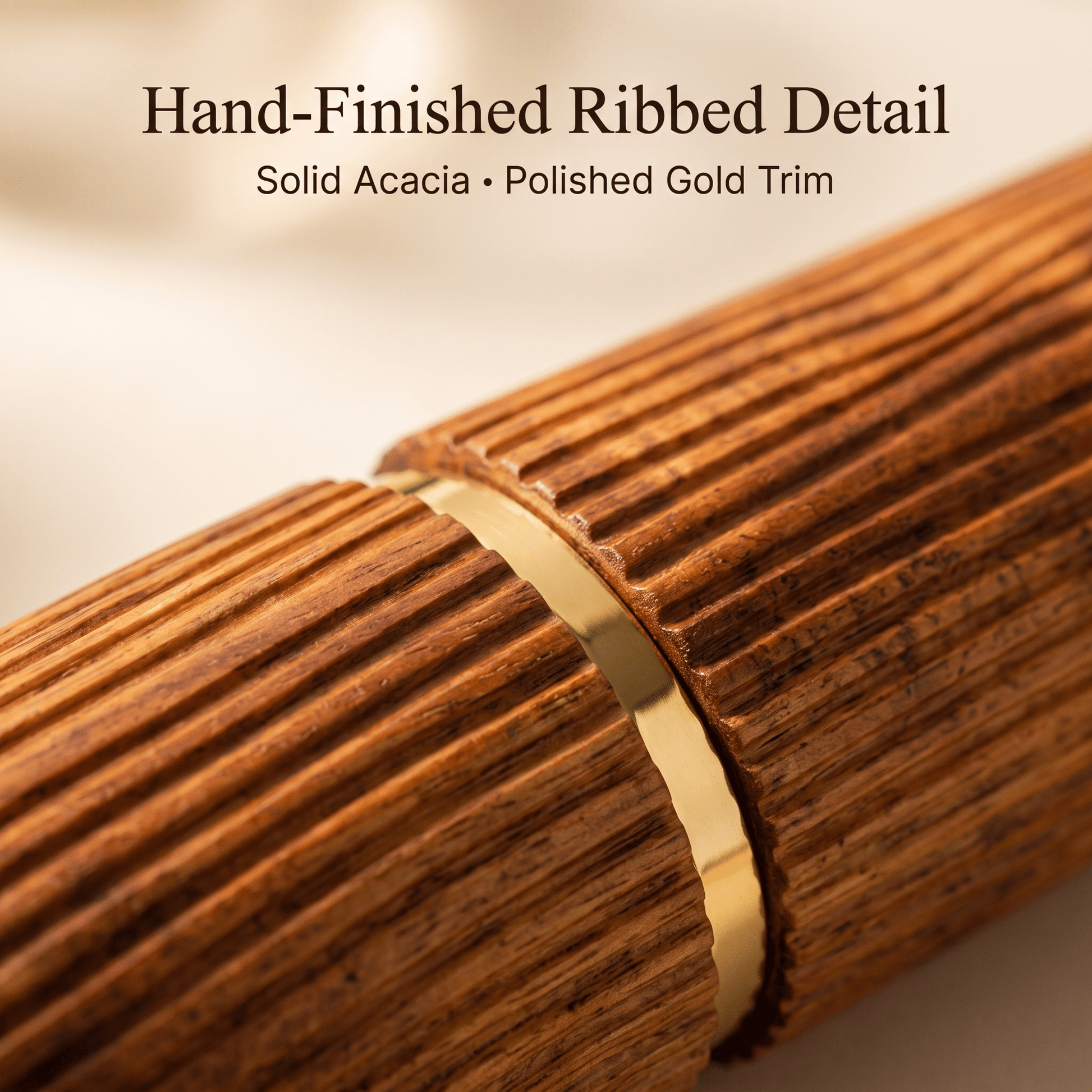 Hand-finished ribbed acacia detail with polished gold trim